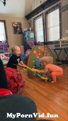 View Full Screen: babies fight over toys.jpg