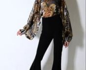 Get an insta worthy look in this AKIRA Label Off The Market Long Sleeve Sheer Blouse, which has dramatic sleeves and a unique print. Complete with a mock neck, button at back of neck, open back, stretchy smocked trim, and all over sheer fabrication, it’ll look great tucked into black cigarette pants. Slide into pumps to keep it sophisticated and sexy.n n- 100% polyestern- Hand wash coldn- 23” shoulder to hemn(approx, measured from small)n- Importedn- Model is wearing size smalln nProduct ID: