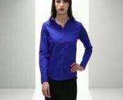 Women&#39;s poplin long sleeve blouse has soft collar styling and rounded bottom hem. Fitted styling with bust and back darts.