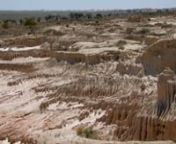 A film by Andrew Pike and Ann McGrath.nnLake Mungo is an ancient Pleistocene lake-bed in south-western New South Wales, and is one of the world’s richest archaeological sites. MESSAGE FR0M MUNGO focuses on the interface over the last 40 years between the scientists on one hand, and, on the other, the Indigenous communities who identify with the land and with the human remains revealed at the site. This interface has often been deeply troubled and contentious, but within the conflict and its gr