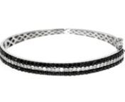 https://www.ross-simons.com/934476.htmlnnBold and brilliant, our bangle bracelet is an on-trend addition to every diamond lover&#39;s collection. Crafted of sterling silver, two rows of black rhodium-plated 2.00 ct. t.w. black diamonds grab your attention, while a middle row of 1.00 ct. t.w. round brilliant-cut white diamonds flashes with dazzling sparkle. Trust us, this is one accessory you can&#39;t pass up! Figure 8 safety. Hinged box clasp, white and black diamond bangle bracelet.