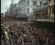 Silent home movie footage of Brisbane including: scenes of Perrins family at home in Hamilton, and of returning troops, etc. marching in Queen Street during WWII.nnOriginal label reads: &#39;Australian 7th Division march through city after return from Middle East c.1942, shows Queen St; scenes of Hamilton during WWII, Endernell Avenue, Gilbert Perrins&#39; home &#39;Clinton&#39;, Brisbane River from Hamilton Heights, trainee dinghys, &#39;Sally IV&#39; - Perrins&#39; first yacht, Max Perrins in cadet midshipman&#39;s uniform a
