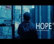 HOPE ST is the story of a young man about to alter the course of his life. As he contemplates going through with an armed robbery, he is haunted by repeating visions of what could go wrong.nnColor, 8mins. USA 2015nnPremiered at OFFF &#39;16 (Odense Intl. Film Festival)nWinner &#39;Best US Live Action Film&#39; at WIFF 17nnCastnnChris JarellnVincent NoticenJasmine RushnIsaiah SewardnnDirectortttElias RessegattinProducertttJohn SeabrightnCinematographertAdam McDaidnEditortttTravis Mooren1st ADtttRyan DearthnP