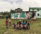 A wall I painted with some local kids in Vanuatu.nThere was no real plan to this I just asked if I could paint this wall and I thought it would be great to get the kids to help. I marked up the outlines and was surrounded by the local kids so I gave them paint brushes and put them to work. nIt was hectic with so many people to paint the same thing but it was an incredible opportunity to meet and work with people from a different culture.nWord spread fast about the wall and at one stage we had 50