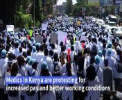 Kenyan medics are taking part in a protest march over pay and working conditions in the capital, Nairobi, amidst an ongoing nationwide doctors&#39; strike that is paralysing health services. At the centre of the row is the government&#39;s move to slash the salaries of medical interns and delay employing them on permanent and pensionable terms.