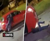 A woman has been arrested and two people injured after a car reversed at a crowd of people and flipped onto its roof - narrowly avoiding a man&#39;s head.&#60;br/&#62;&#60;br/&#62;The shocking incident - caught on camera - saw a group crowding around a red Volkswagen Golf, kicking at its doors and headlights.&#60;br/&#62;&#60;br/&#62;It then reversed at speed towards a man standing in front of a parked car around 20 metres behind the Golf.&#60;br/&#62;&#60;br/&#62;While it was reversing, the man moved out of the way and fell to the floor, but the Golf hit the stationary car and flipped, narrowly missing his head as he lay on the road.&#60;br/&#62;&#60;br/&#62;Mobile phone footage captured the disorder, which occurred outside The Cock pub in Bartley Green, Birmingham, just after midnight on Saturday morning.&#60;br/&#62;&#60;br/&#62;Two women were taken to hospital with injuries which are not believed to be life-changing, West Midlands Police said. No further injuries had been reported.&#60;br/&#62;&#60;br/&#62;The force said its officers attended the scene and arrested a woman suspected of dangerous driving. She remained in custody this morning (Sun).&#60;br/&#62;&#60;br/&#62;A spokesperson said: &#92;