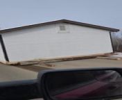 A person witnessed movers pulling a house on the road using a tractor, creating a unique sight.