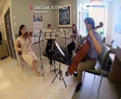 The corridors of a Gold Coast hospital are filled with beautiful sounds, offering a much-welcomed respite for some patients.