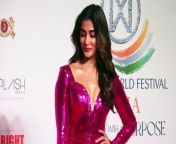 Pooja Hegde marked her glamorous presence at the 7th Miss World Grand Finale. She dressed up in v neckline, body hugging pink shimmery gown.