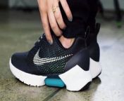 Nike&#39;s Tinker Hatfield and Tiffany Beers explain the new power-lacing HyperAdapt 1.0 and demonstrate how to charge the sneakers, and tighten and loosen the laces with the touch of a button.