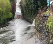 Water pouring on to road in Union Mills from water riti riwaj
