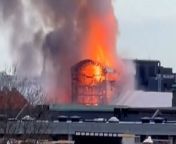Footage filmed on April 16 shows a plume of smoke billowing into the air and flames engulfing the building.