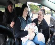 A woman gave birth to her baby in the front seat of a car after getting stuck in traffic on the way to the hospital.