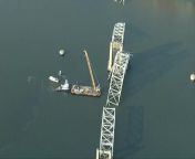 Heavy machinery, including the largest crane on the Eastern Seaboard, is being assembled in the water around Baltimore to begin removing the wreckage of the collapsed Francis Scott Key Bridge.